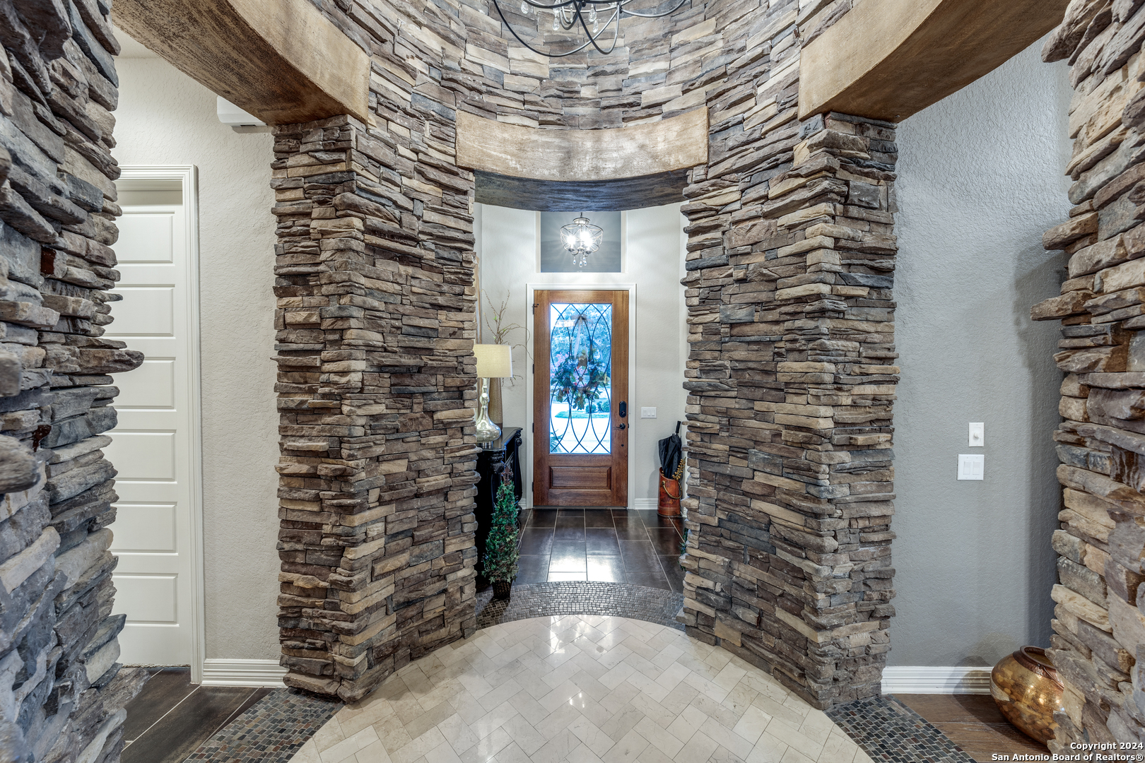 a view of entryway with a front door and couch