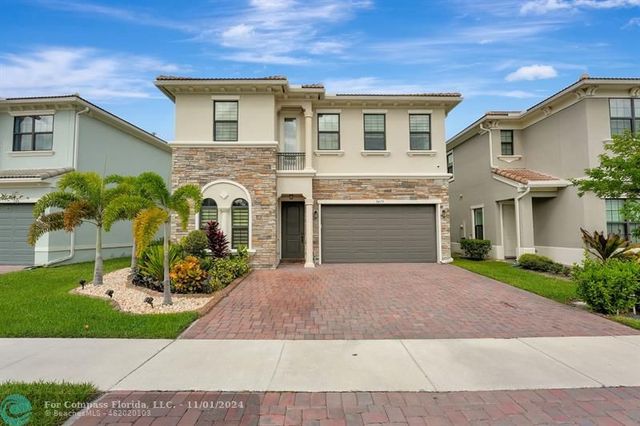 $1,095,000 | 8475 Northwest 39th Court | Village Green