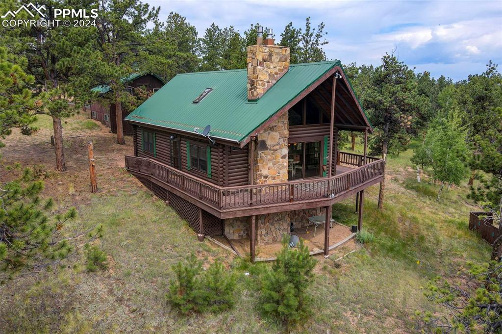 an aerial view of a house with balcony