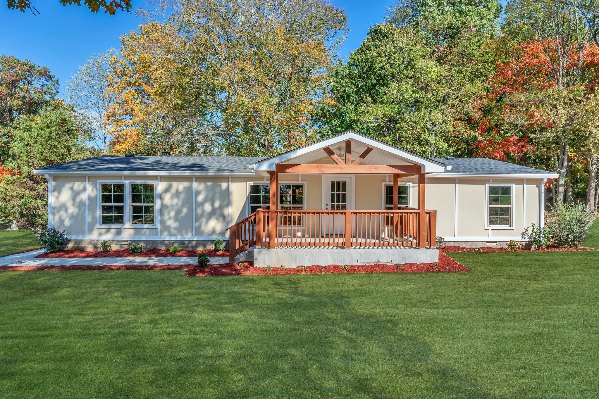 front view of a house with a yard