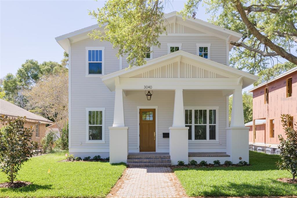 front view of a house with a yard