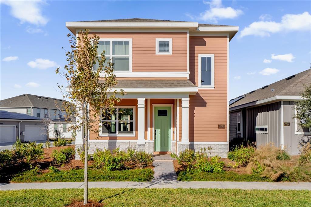 front view of a house with a yard