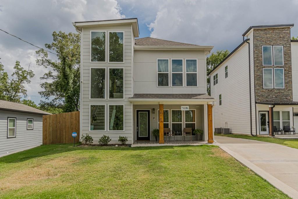 front view of a house with a yard