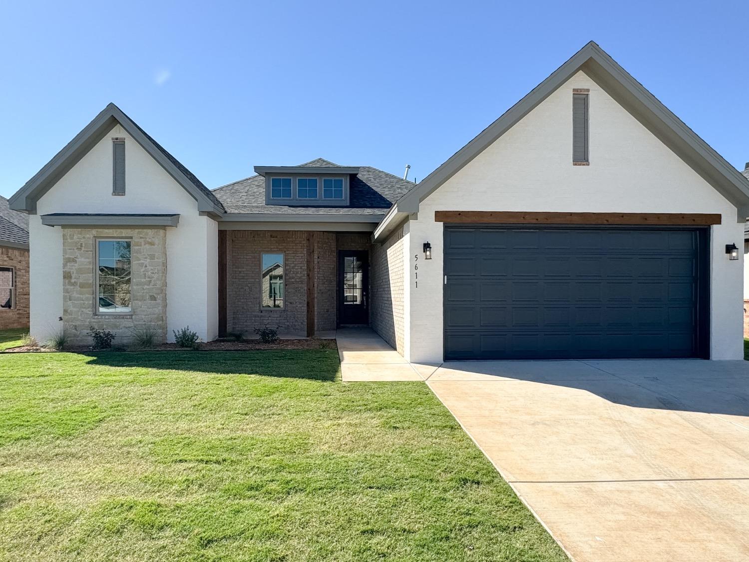 a front view of house with yard