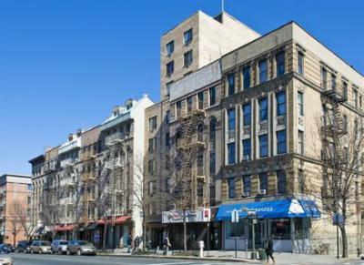 a front view of a building with street