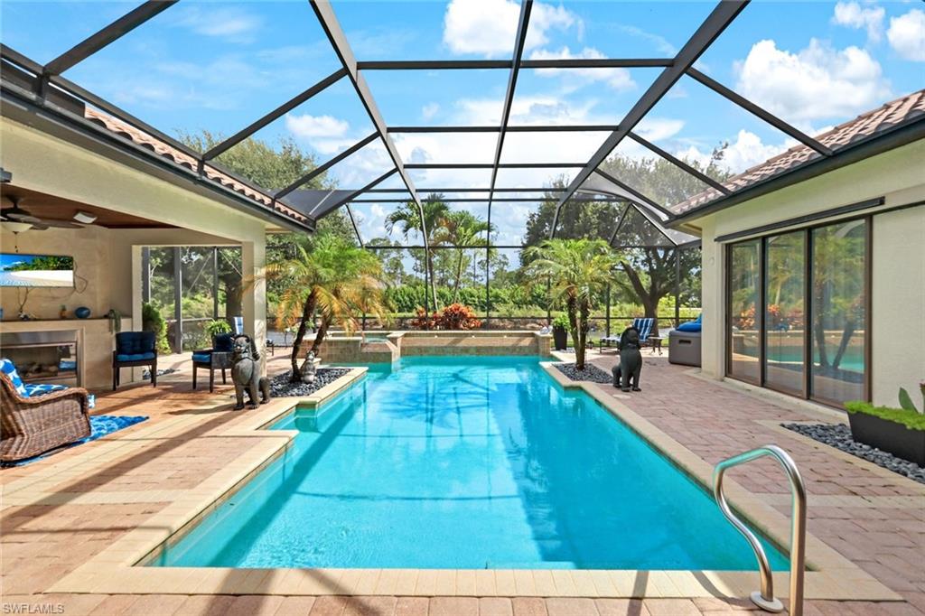 a view of a swimming pool with a patio