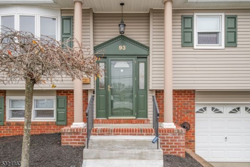 a view of a brick house with a small space