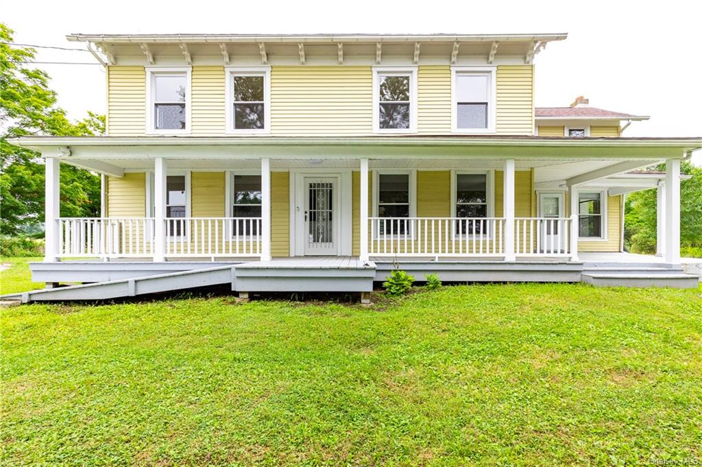 a house view with a garden space