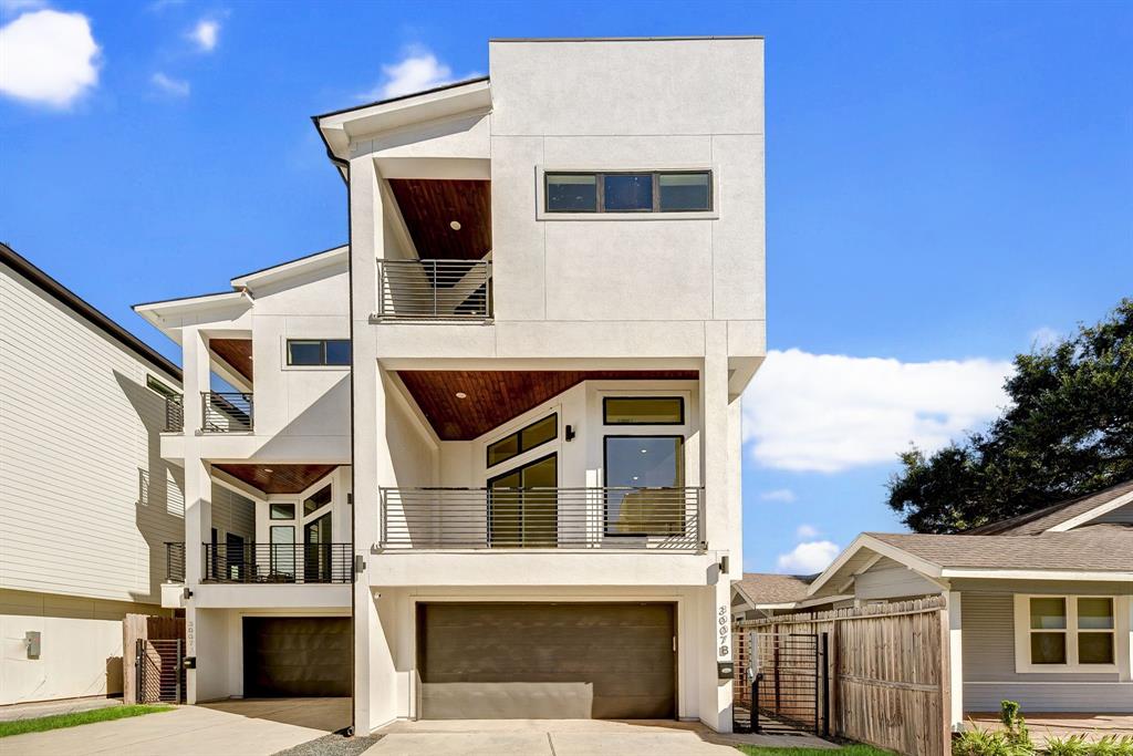 a front view of a house with a garage