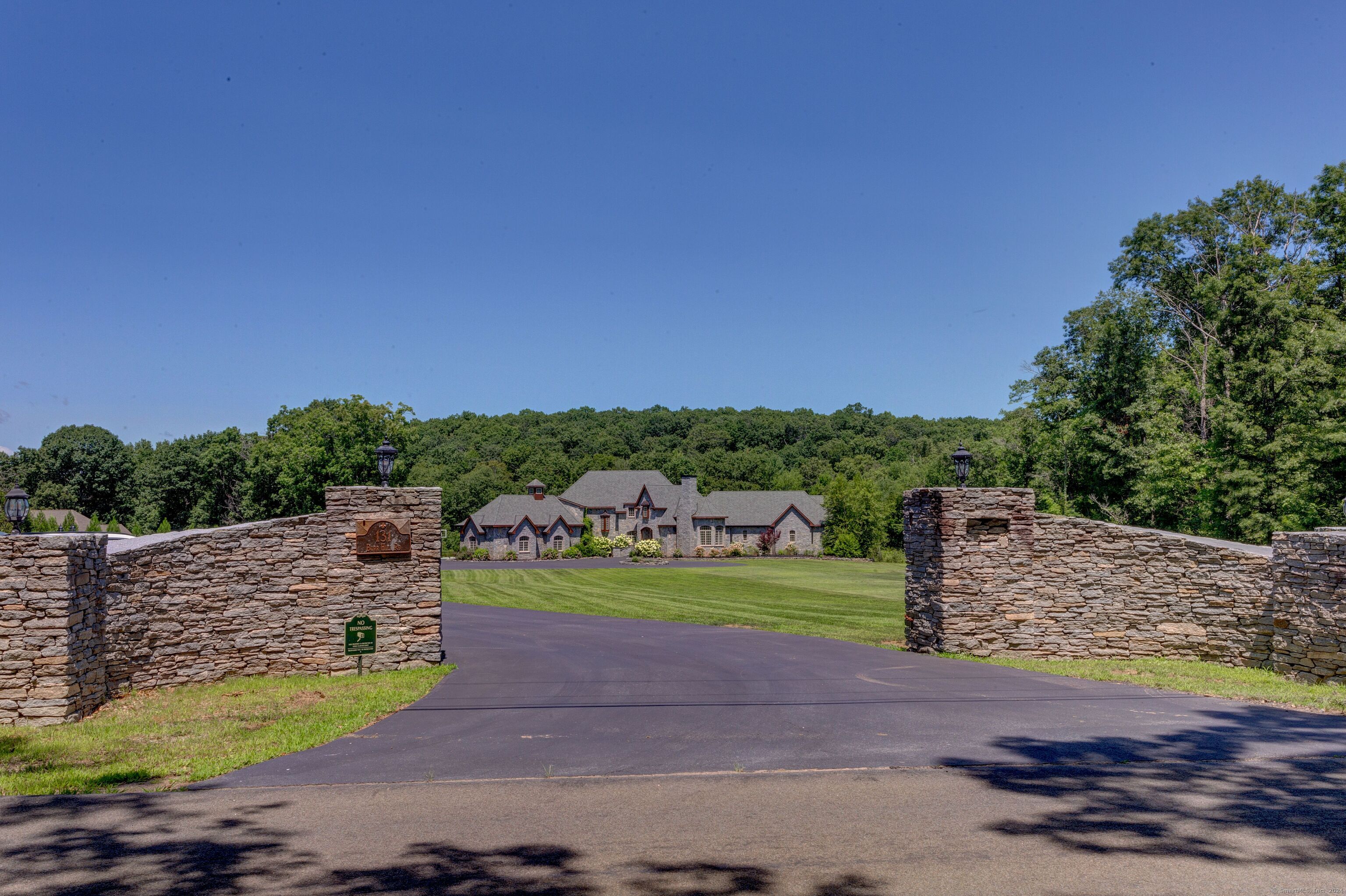 a view of a road with a yard