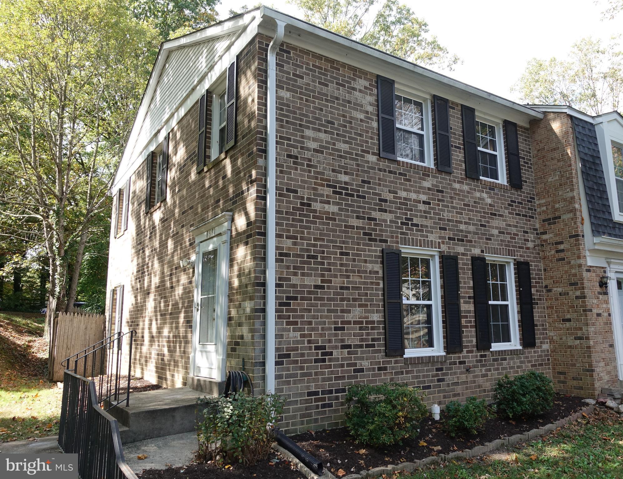 a brick building with a large windows