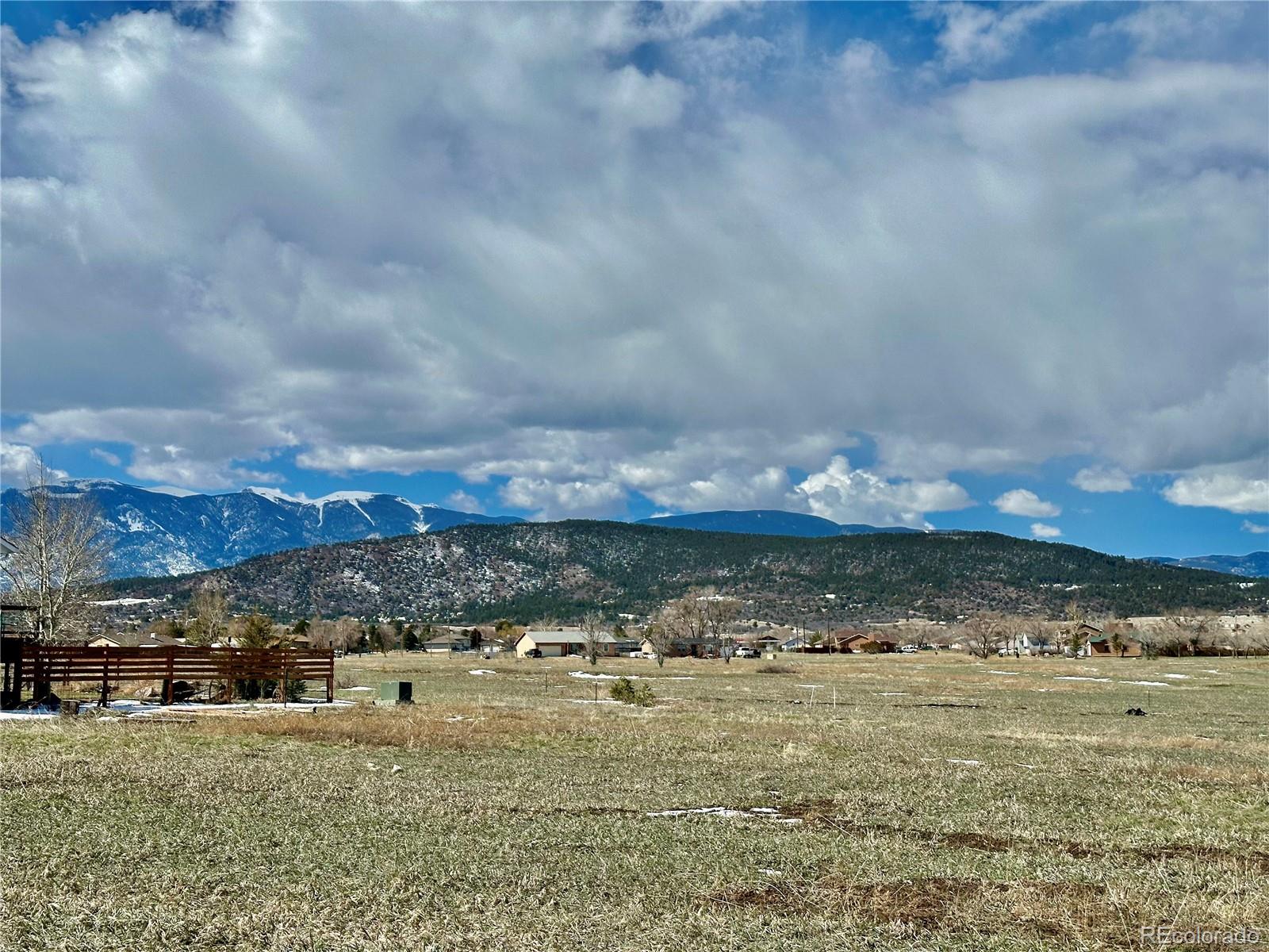 a view of a town with mountains