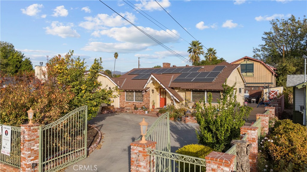 a house view with a garden space