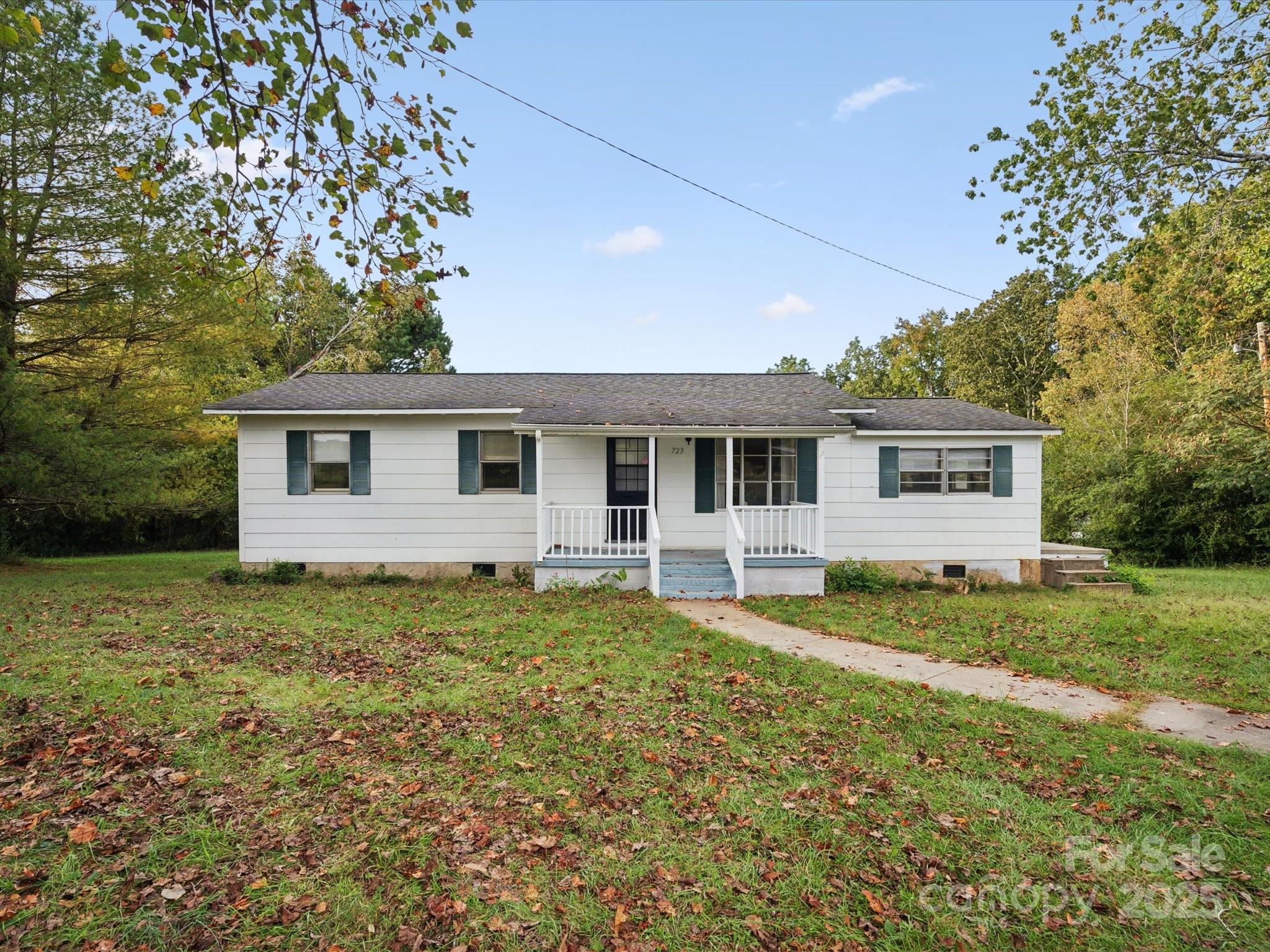 front view of a house with a yard