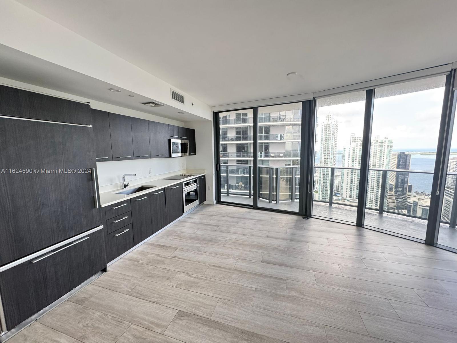 a open kitchen with a large window