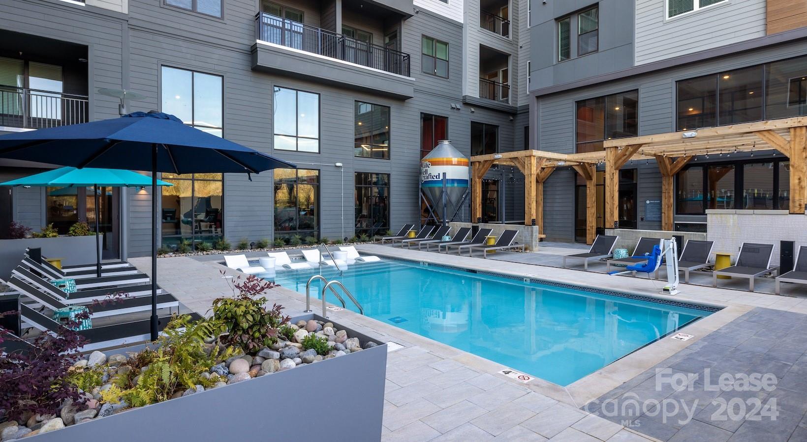 a view of a house with a swimming pool