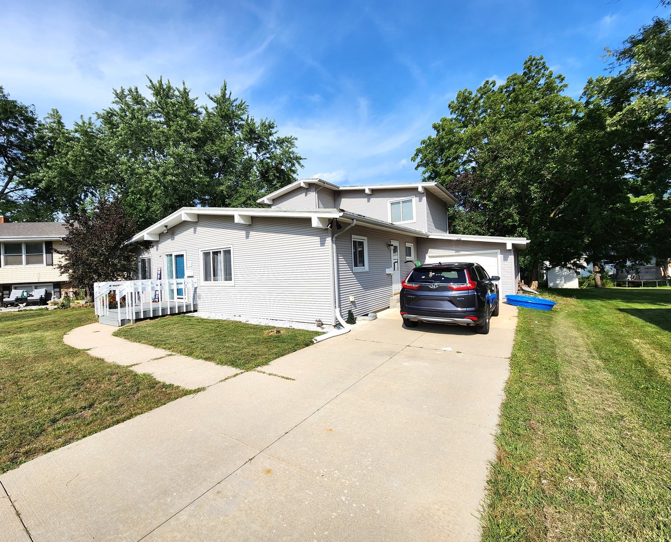 a house view with a garden space