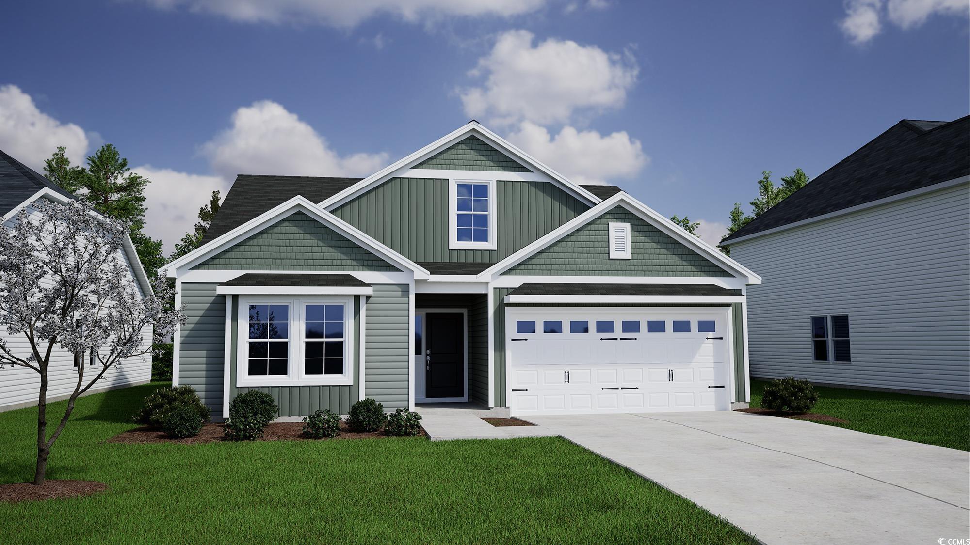 Craftsman house with a front lawn