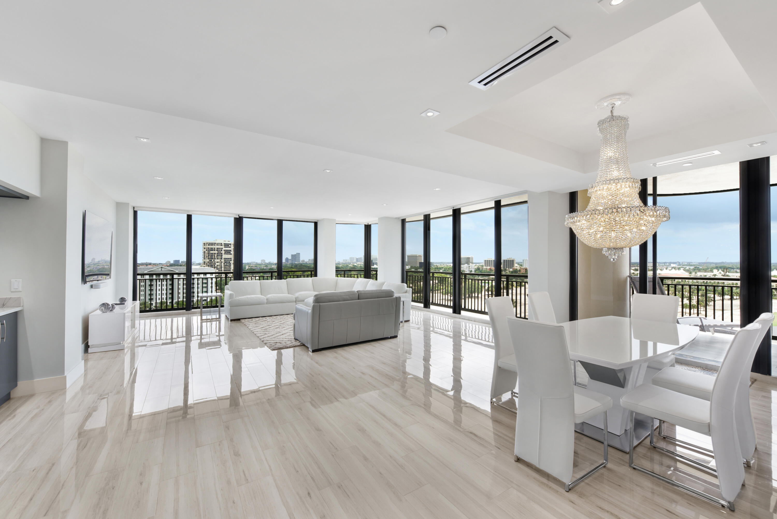 a dining room with furniture and wooden floor