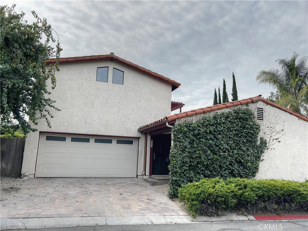 a view of a house with a garage