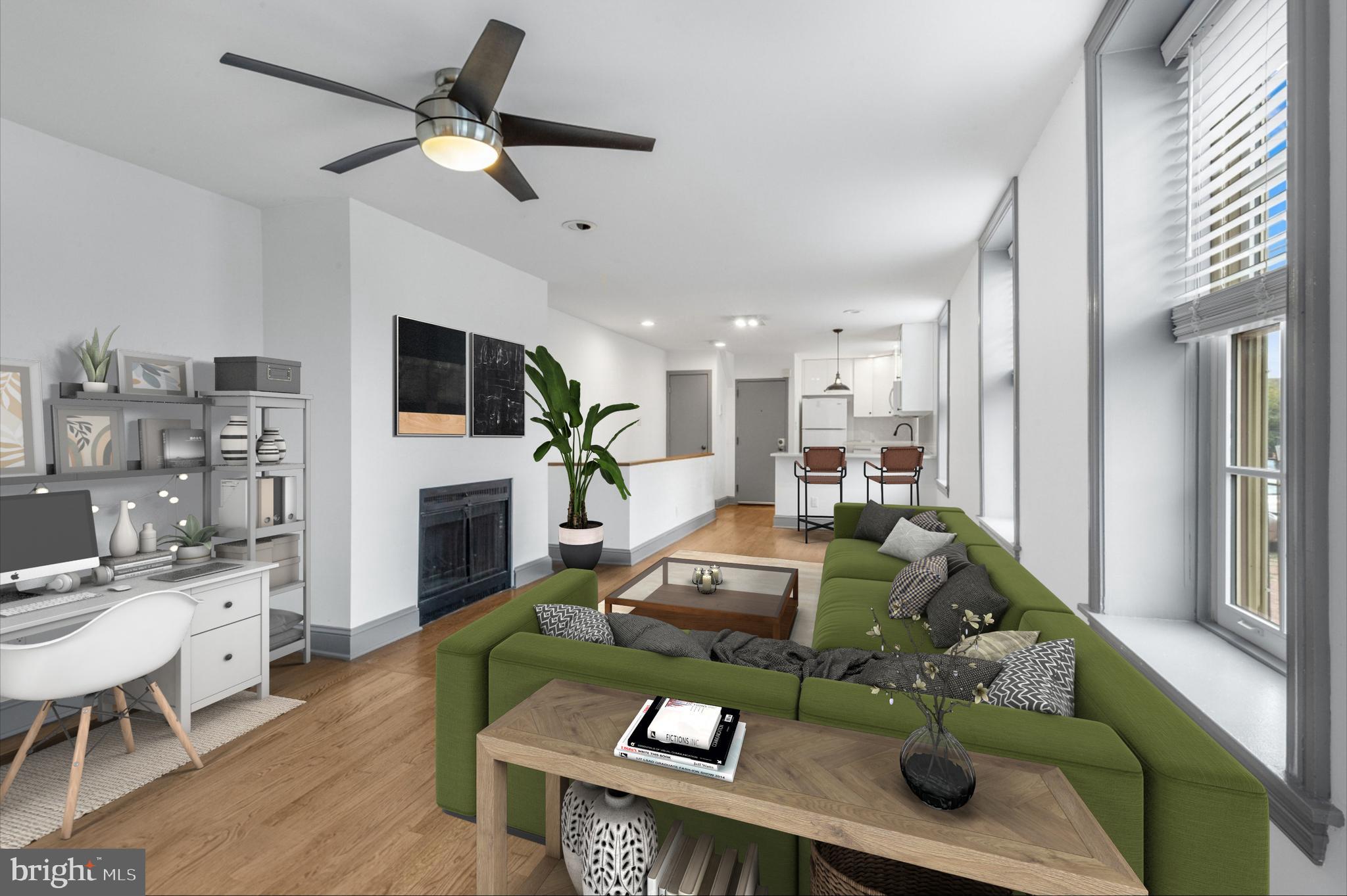 a living room with furniture fireplace and a flat screen tv