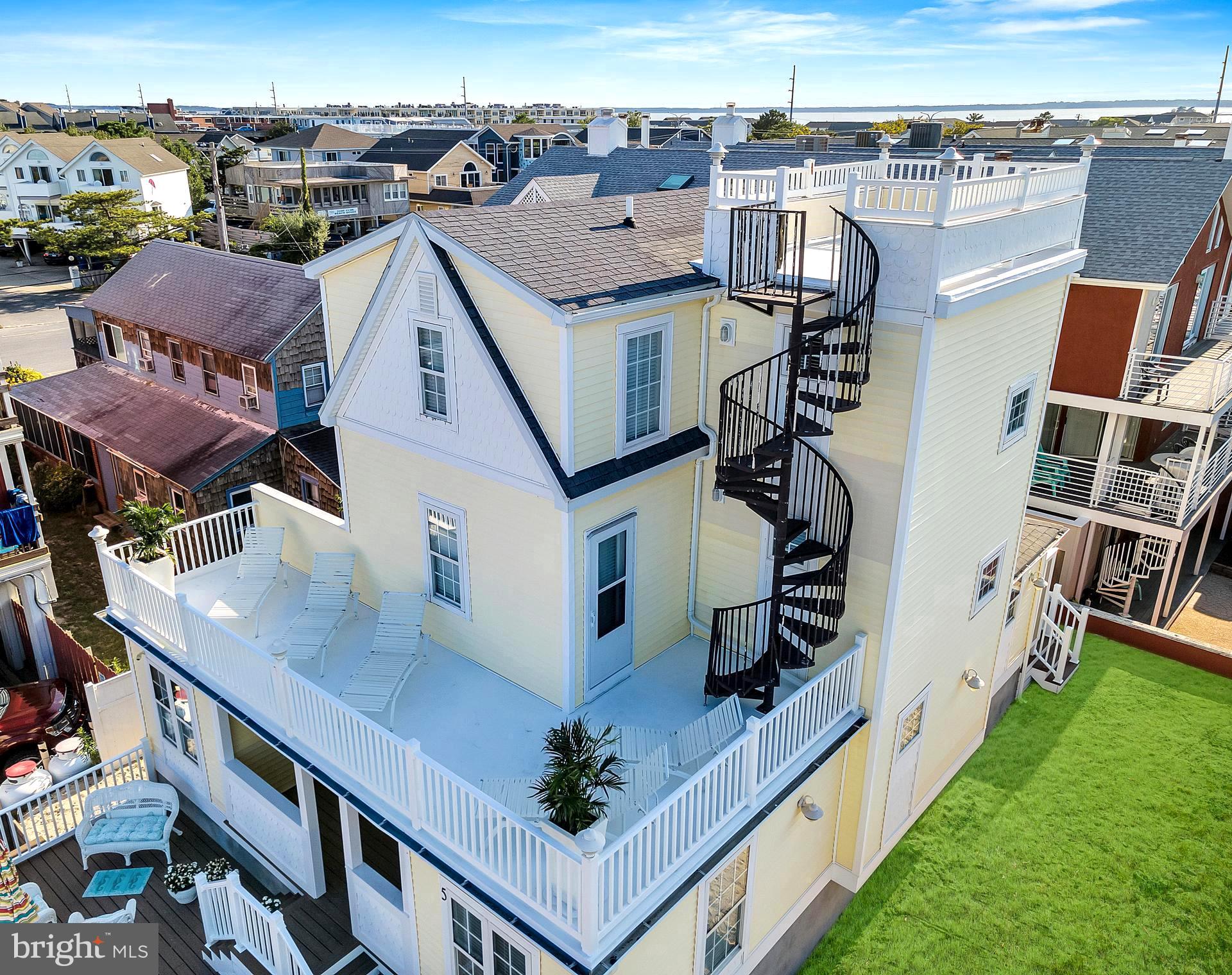 an aerial view of a house with a garden