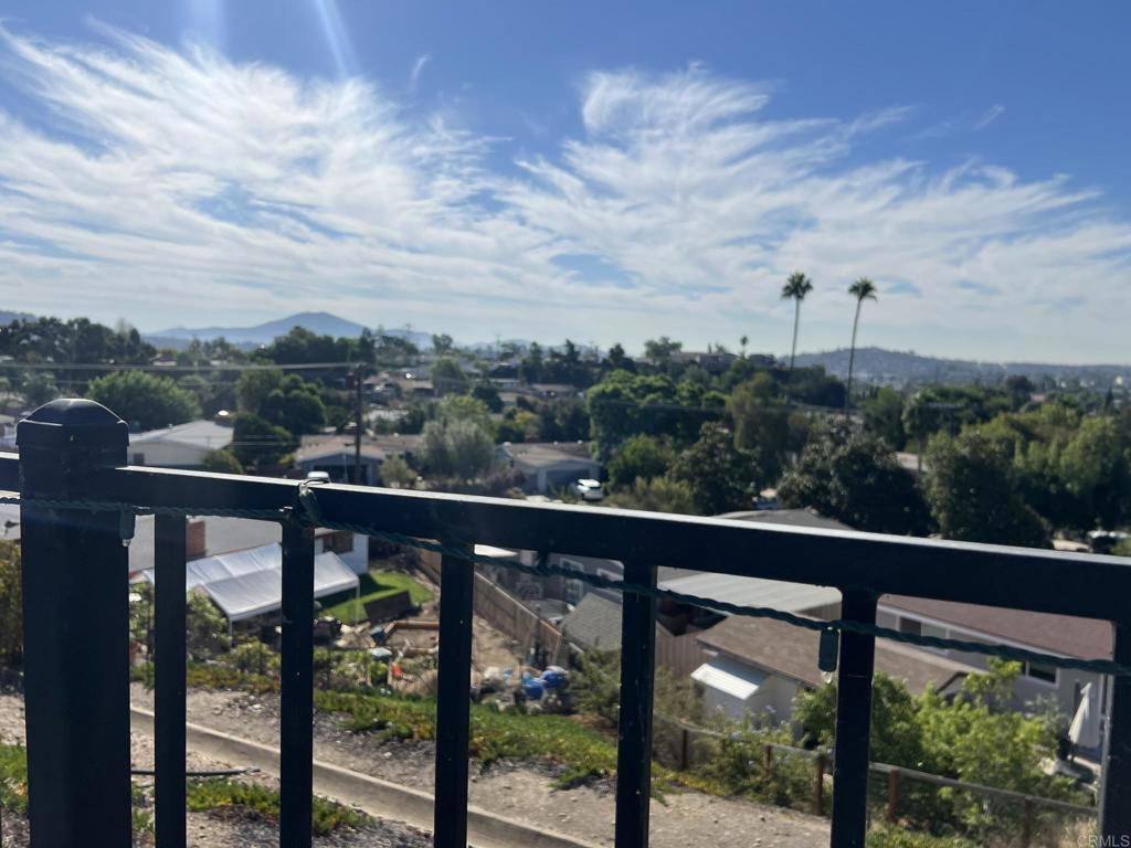 a view of a city skyline from a balcony