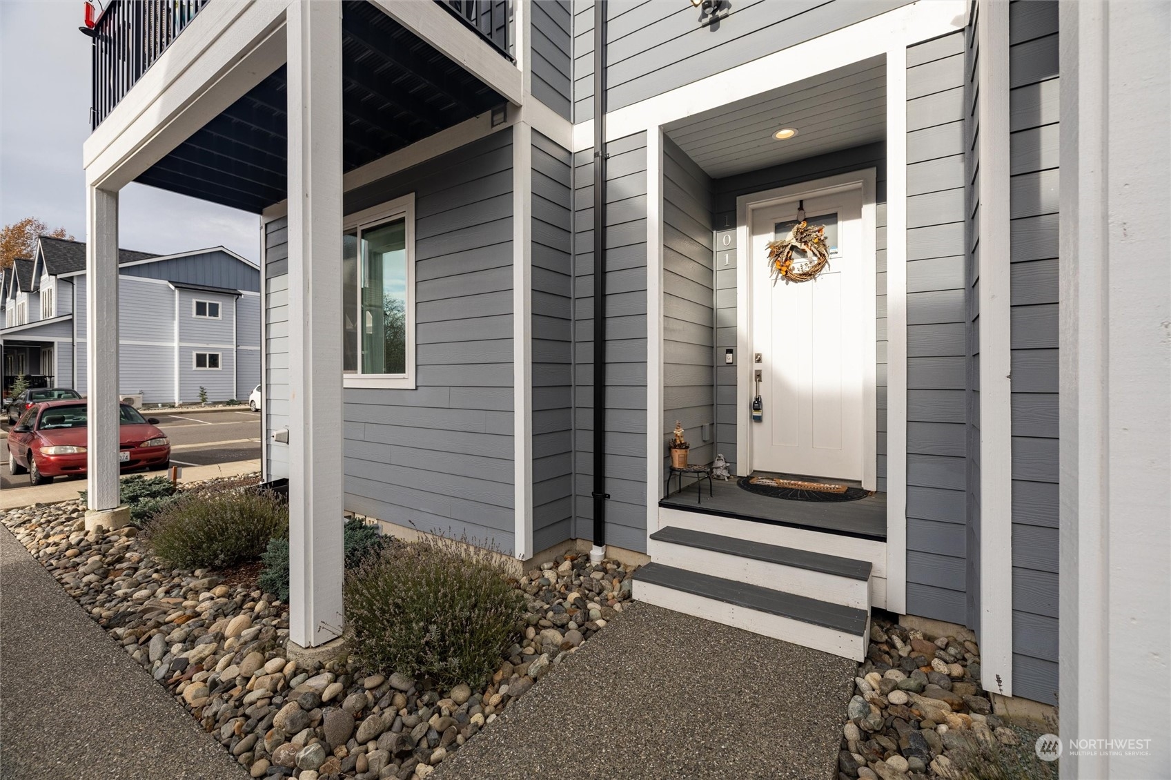 a view of a house with a door and a outdoor space