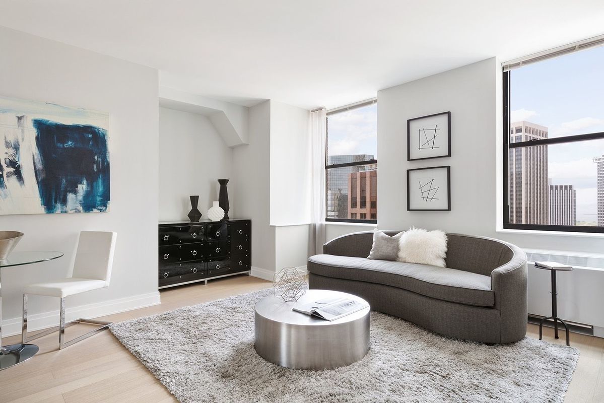 a living room with furniture and a couch