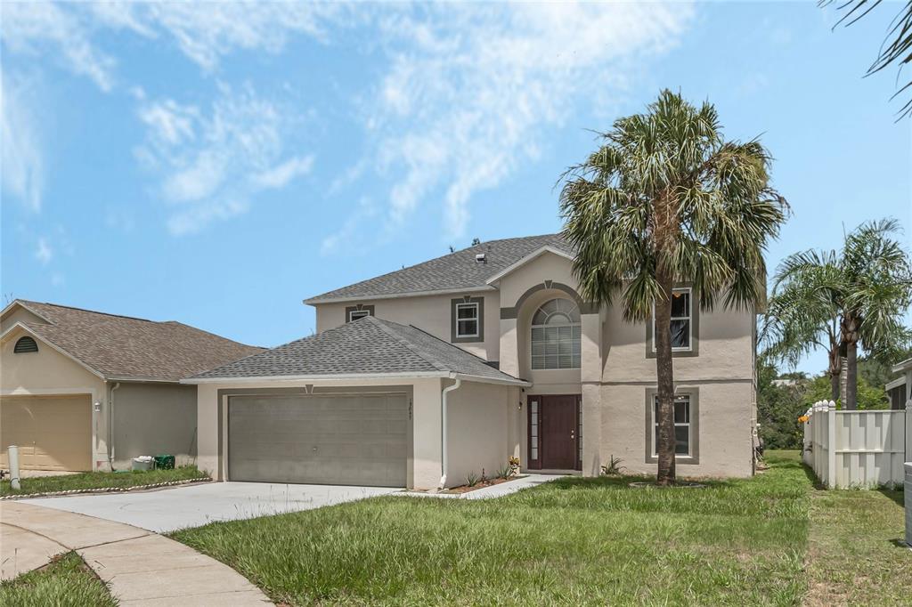 front view of a house with a yard