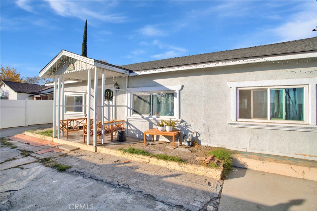 a front view of a house with a outdoor space