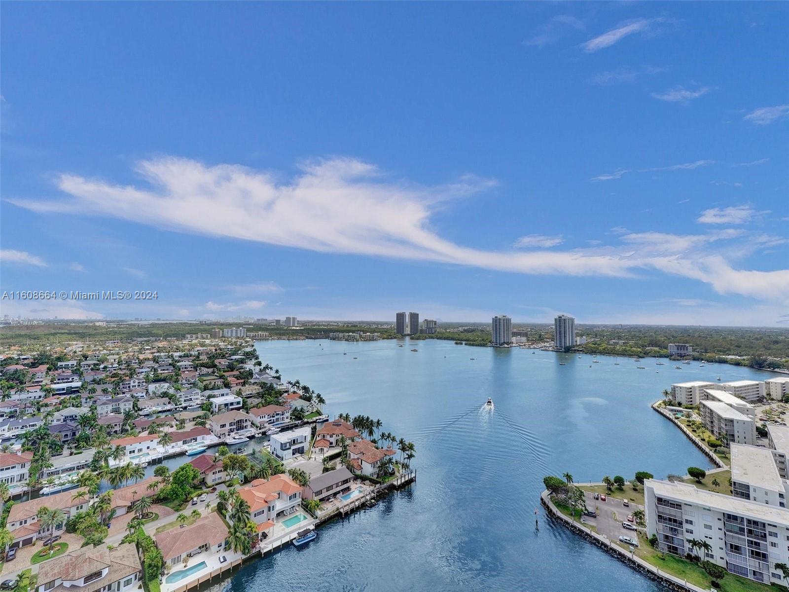 a view of a lake with a city