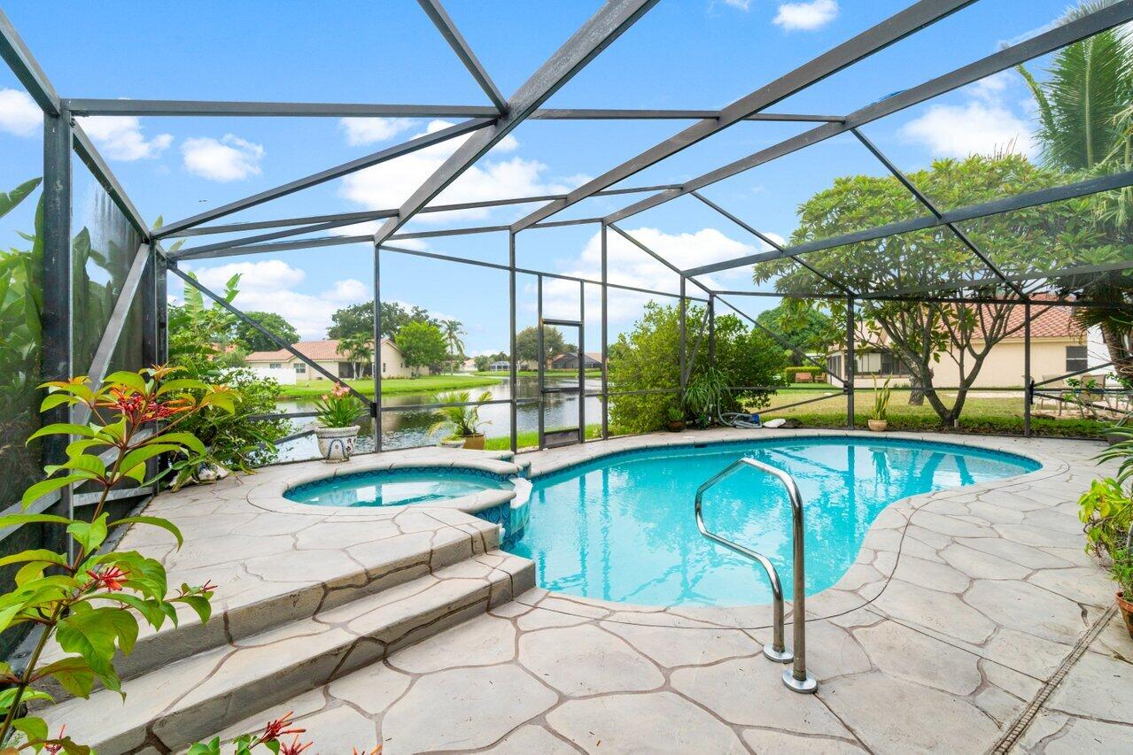 a view of a swimming pool with a patio