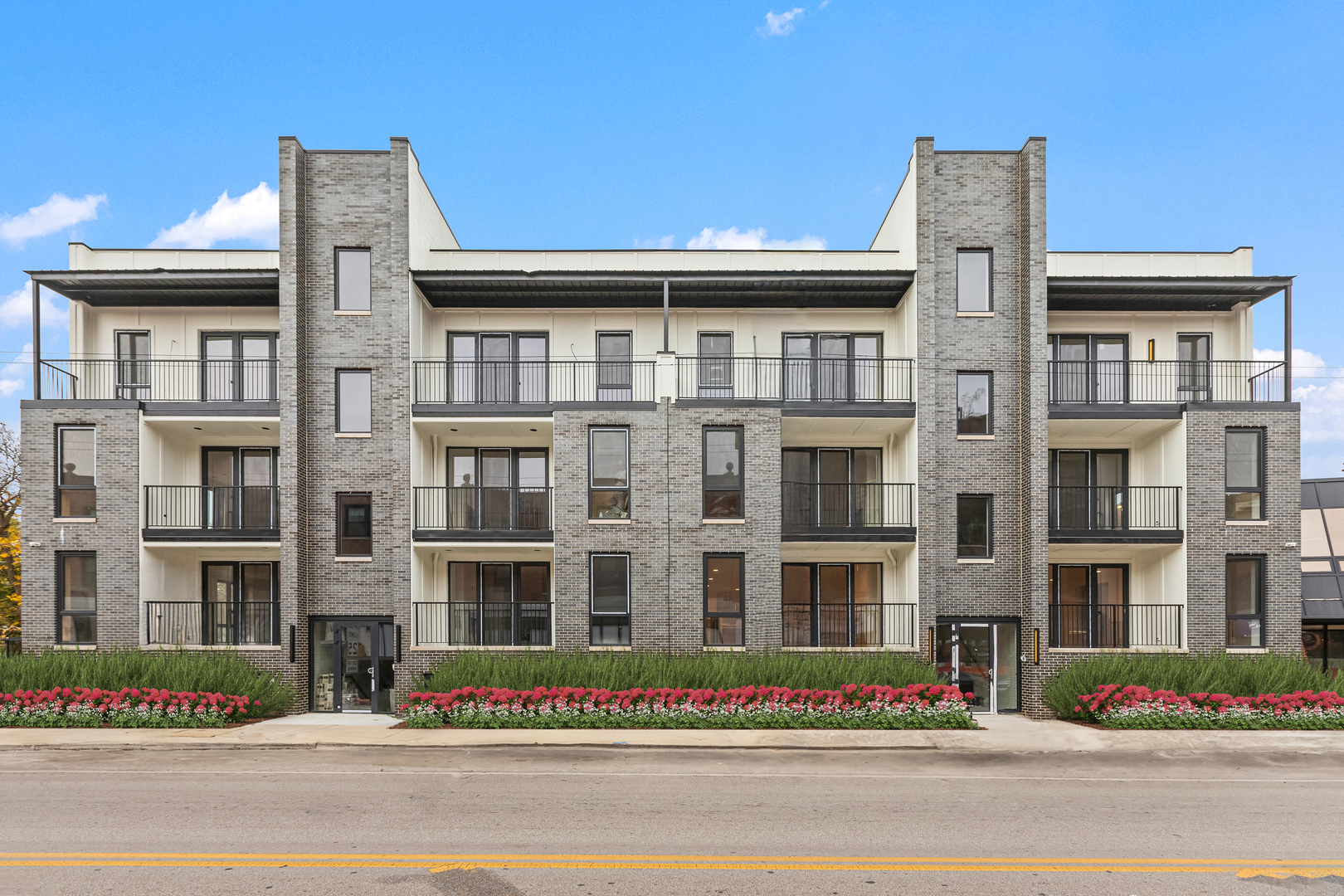 a front view of multi story residential apartment building