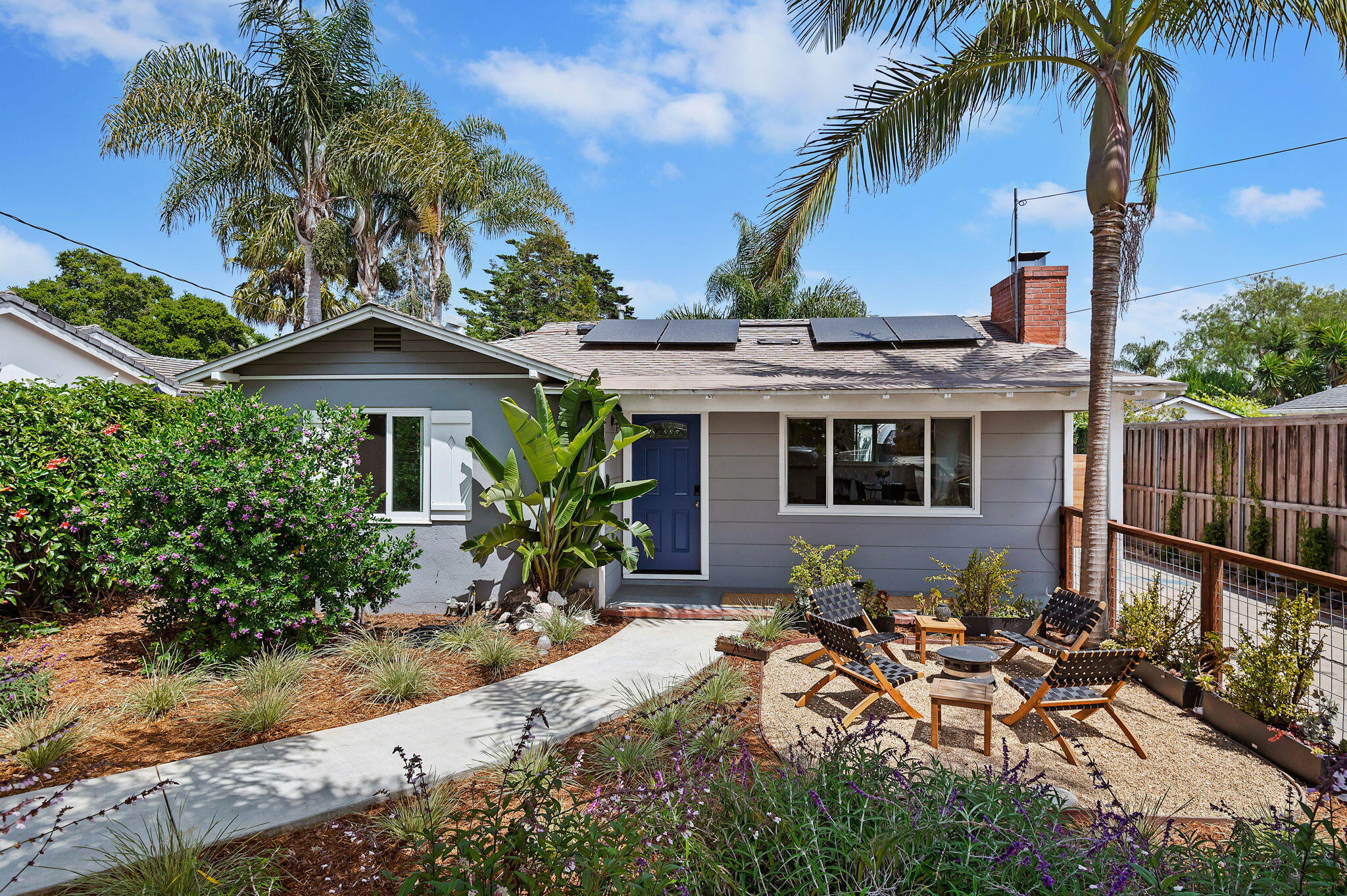 a front view of a house with a patio