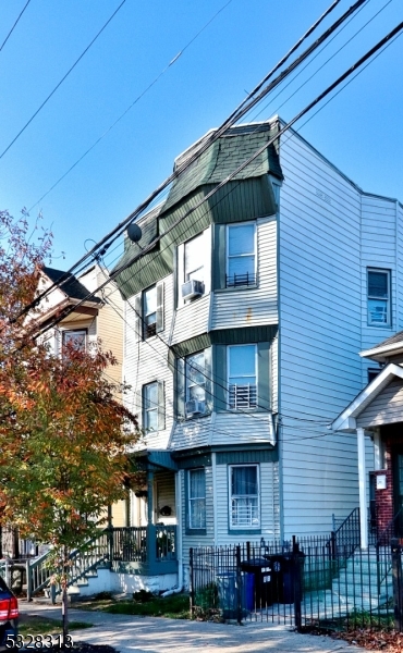 a view of a building with a garden