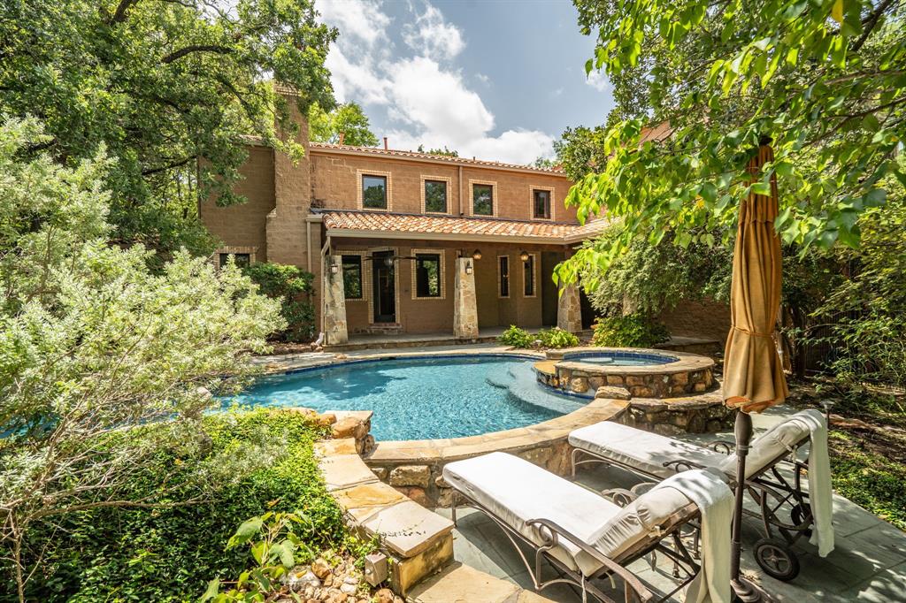 front view of a house with swimming pool