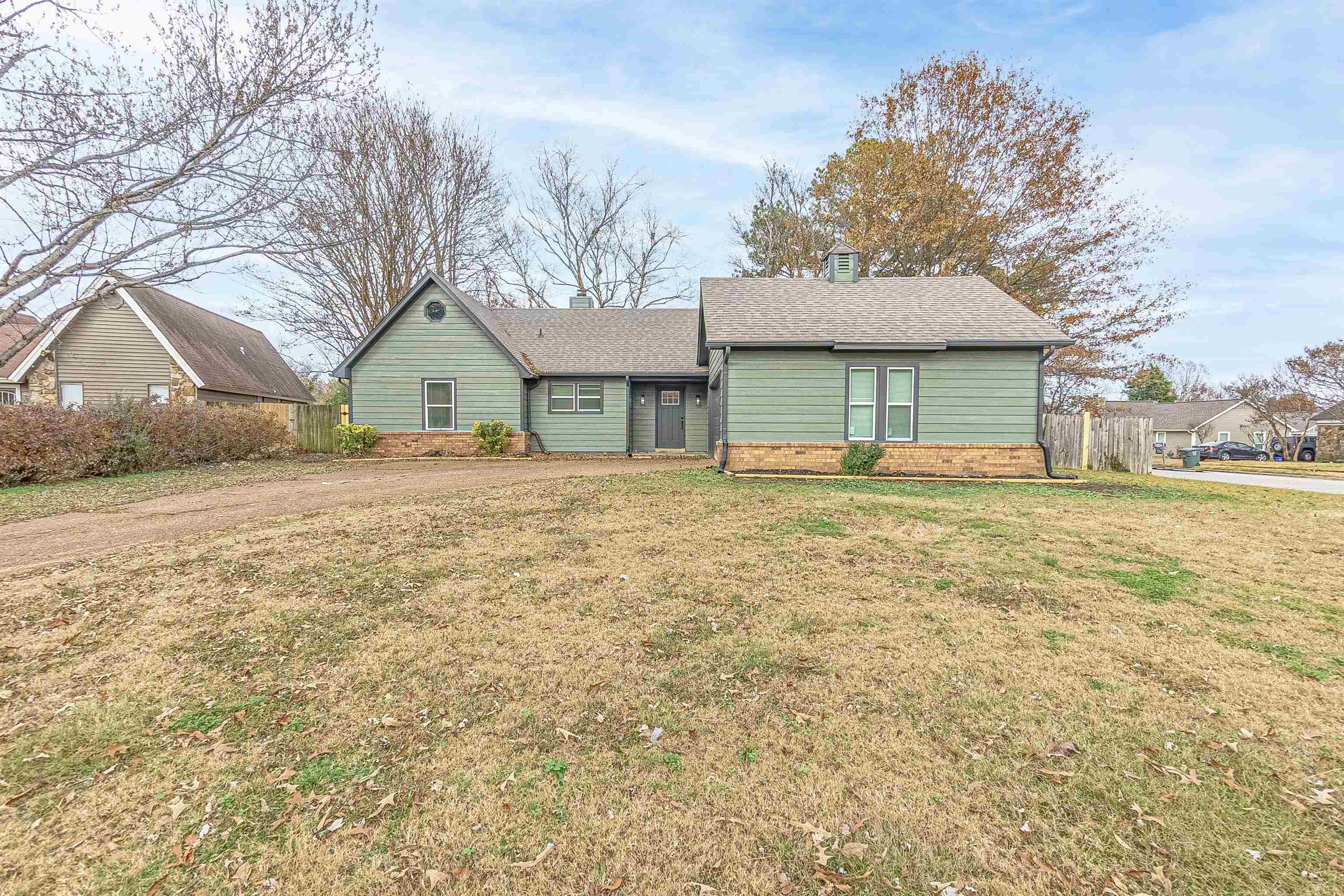 Single story home featuring a front yard