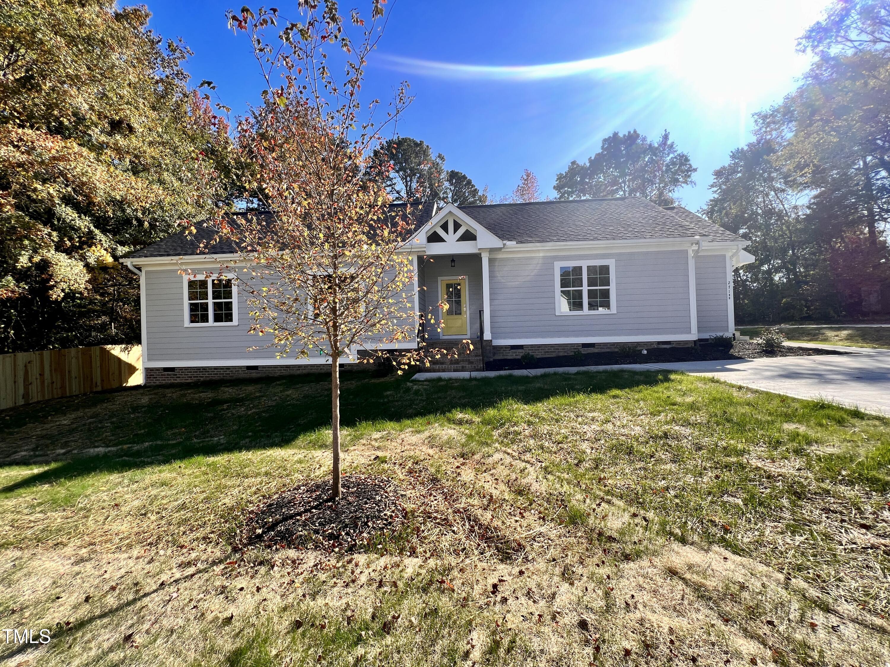 a house view with a garden space