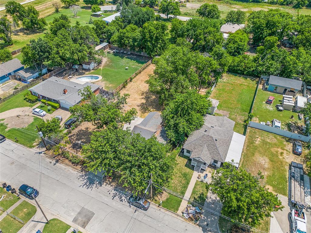 an aerial view of a house with a garden