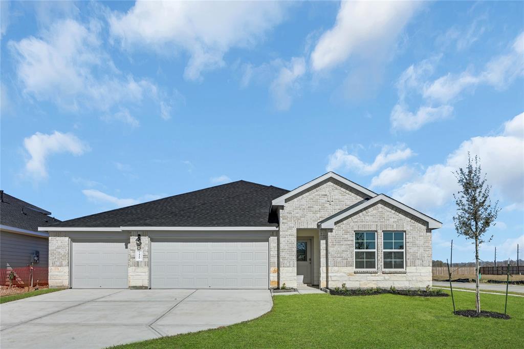 front view of a house with a yard