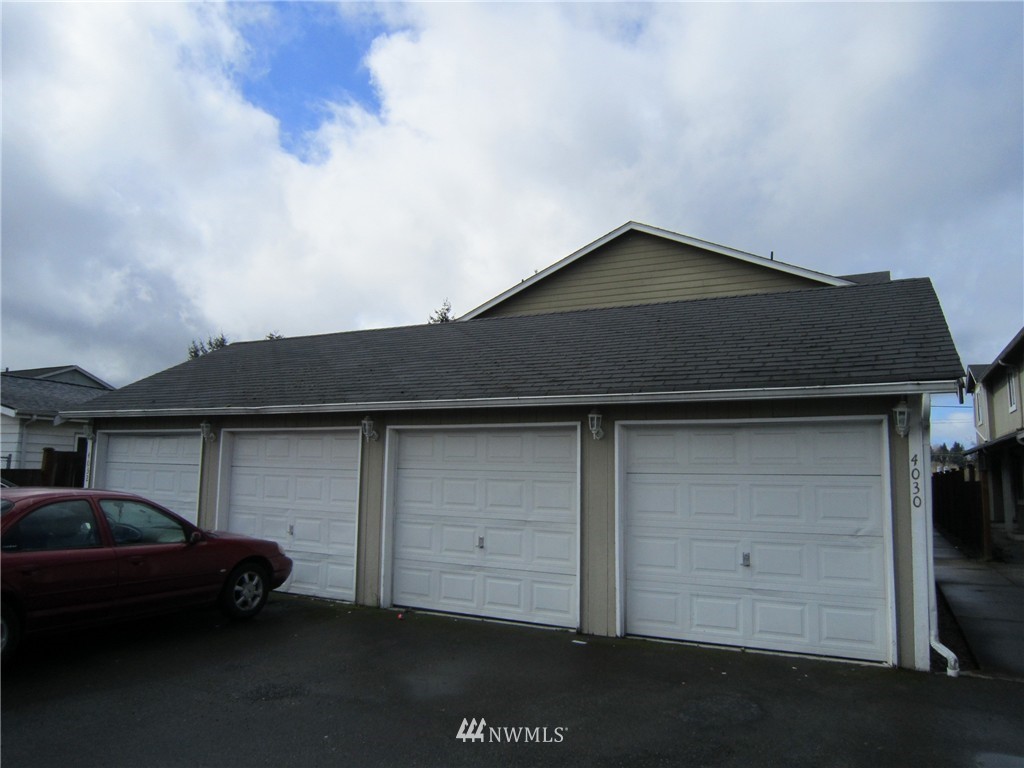 a car parked in front of a house