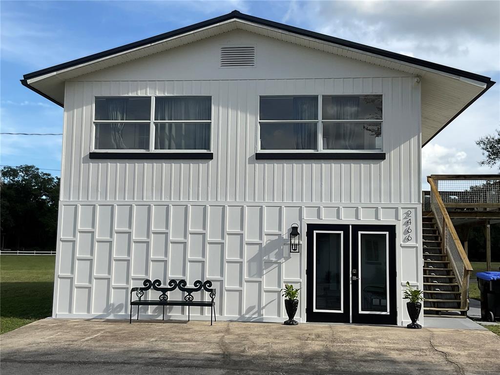 a front view of a house with garage