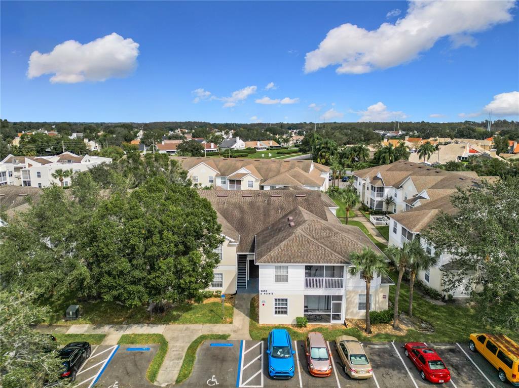 an aerial view of a house with a ocean view