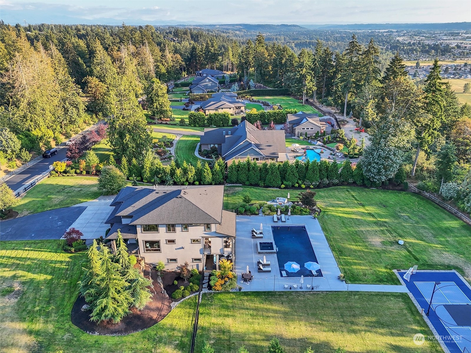 an aerial view of a house with a garden lake view