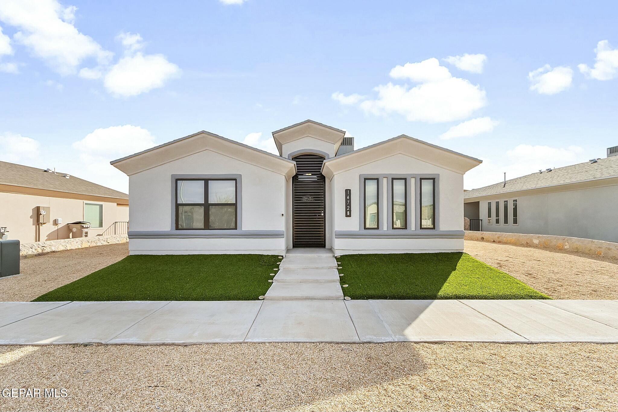 a front view of house with yard