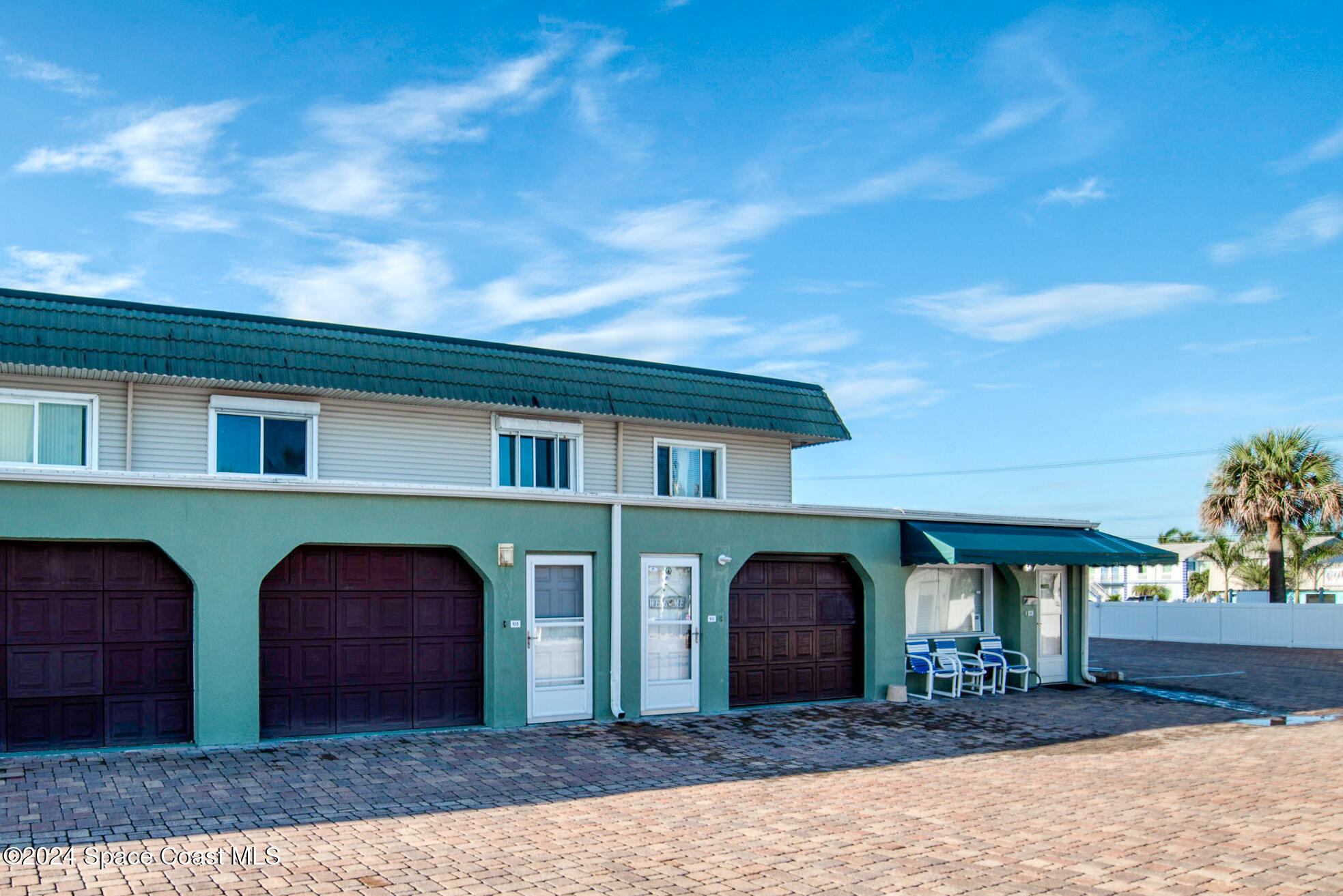 a front view of a house with yard