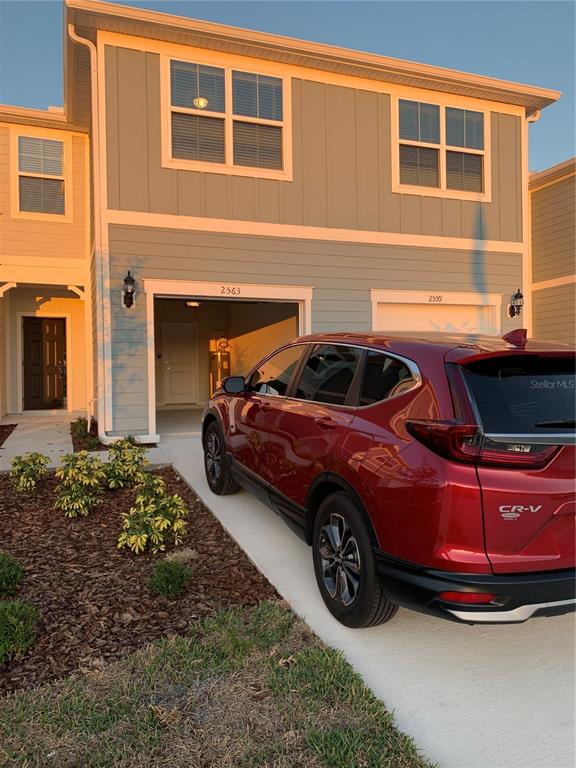 a car parked in front of a building