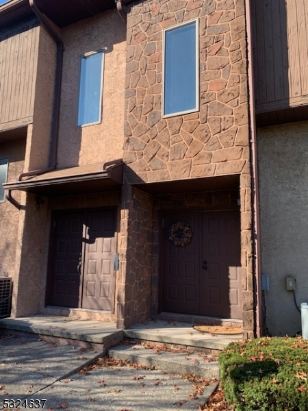 a view of house with entrance door