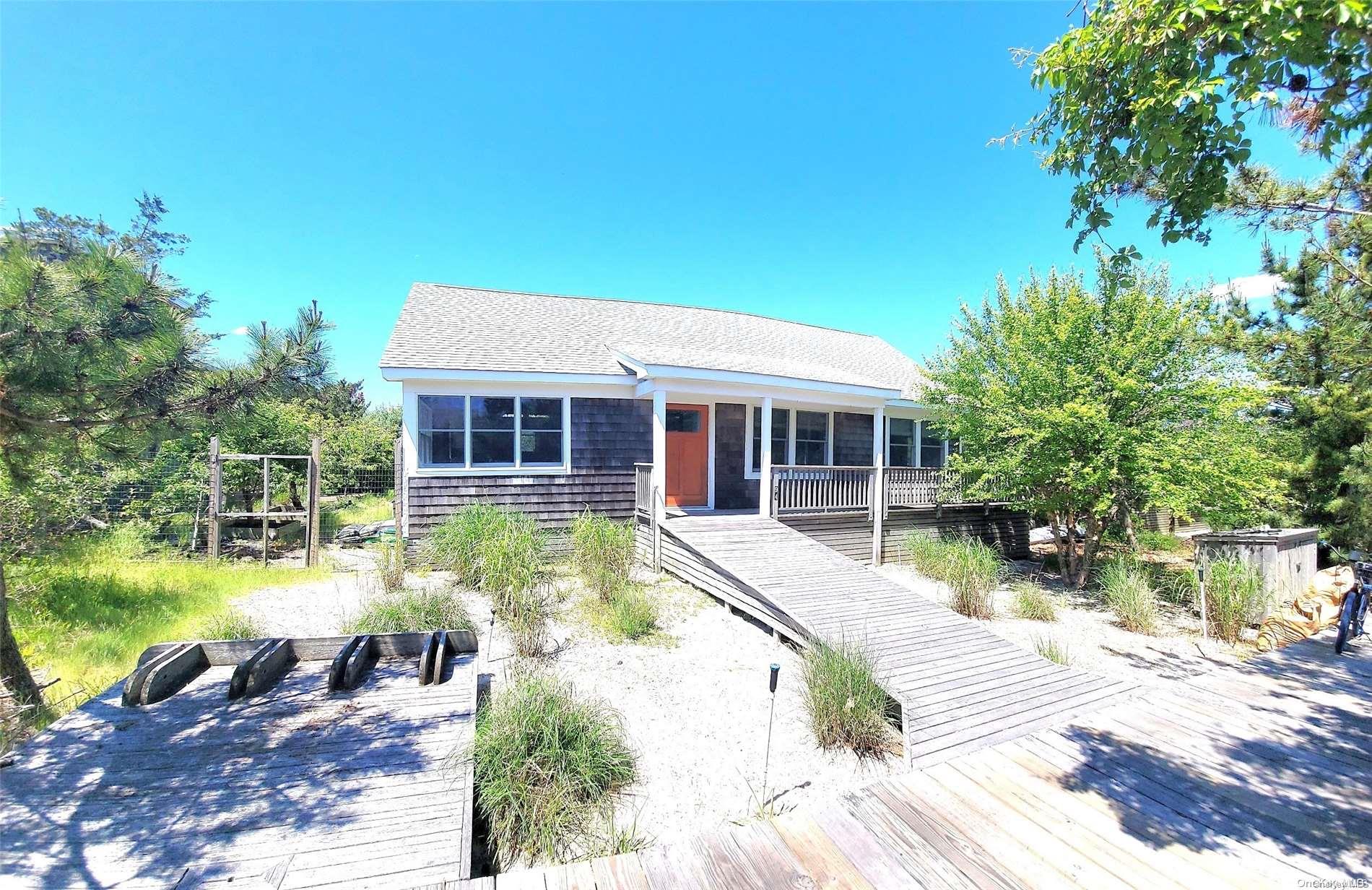 a view of a house with swimming pool and yard